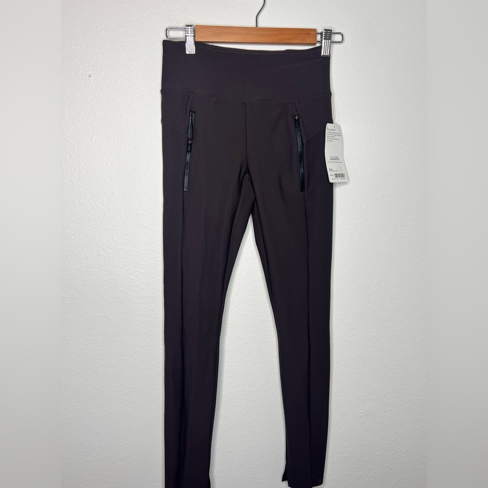 Athleta Stellar Tight Leggings with Zipper Pockets
